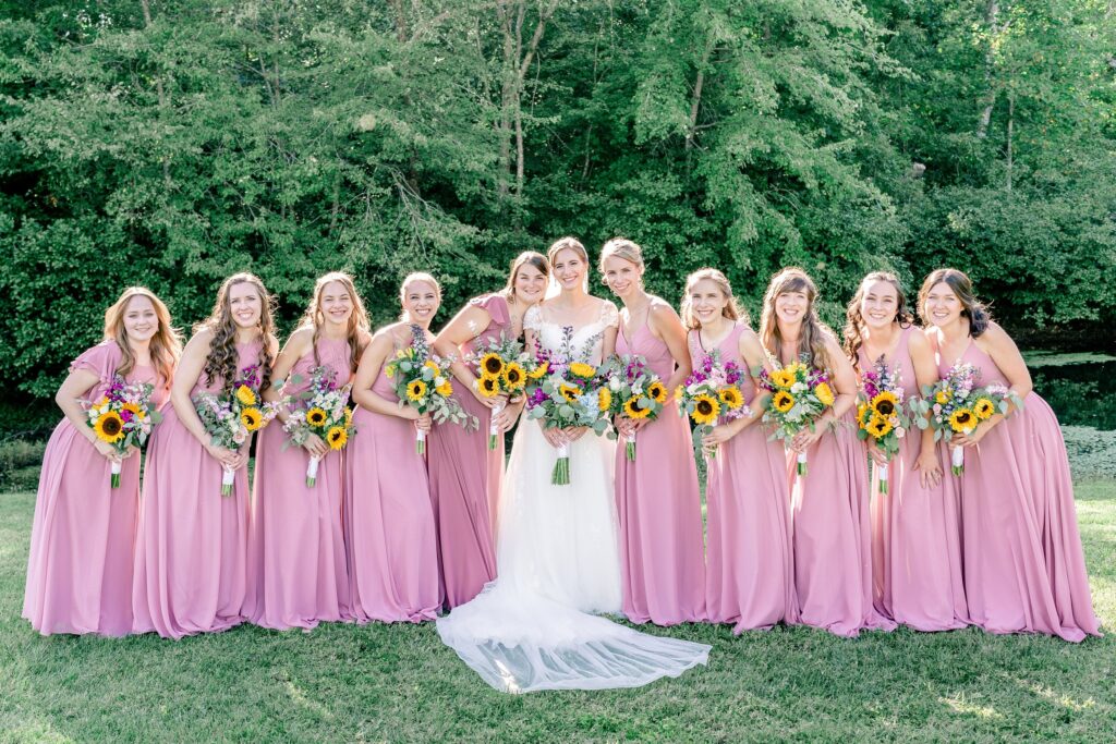 A bridal party posing for a photo during a Stevenson Ridge wedding reception