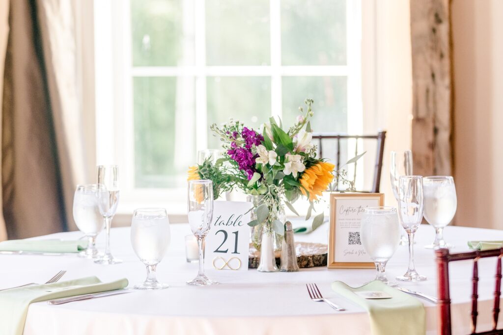 A close up of table decor for a Catholic wedding in Fredericksburg, VA