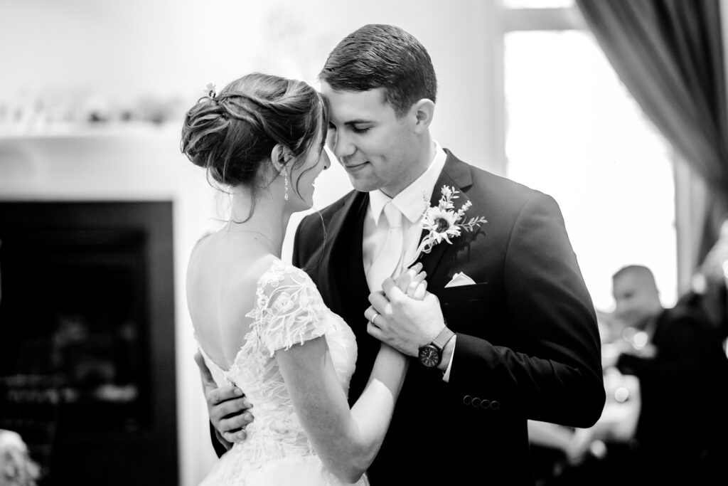 A close up of the bride and groom sharing their first dance for a Catholic wedding in Fredericksburg, VA