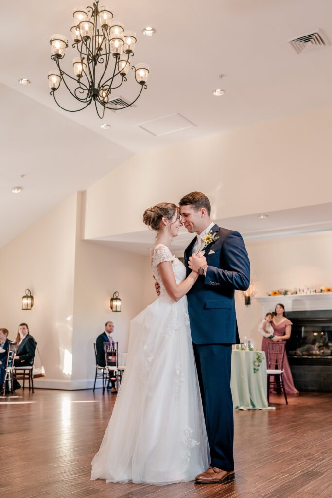 A bride and groom sharing their first dance at their Stevenson Ridge wedding reception