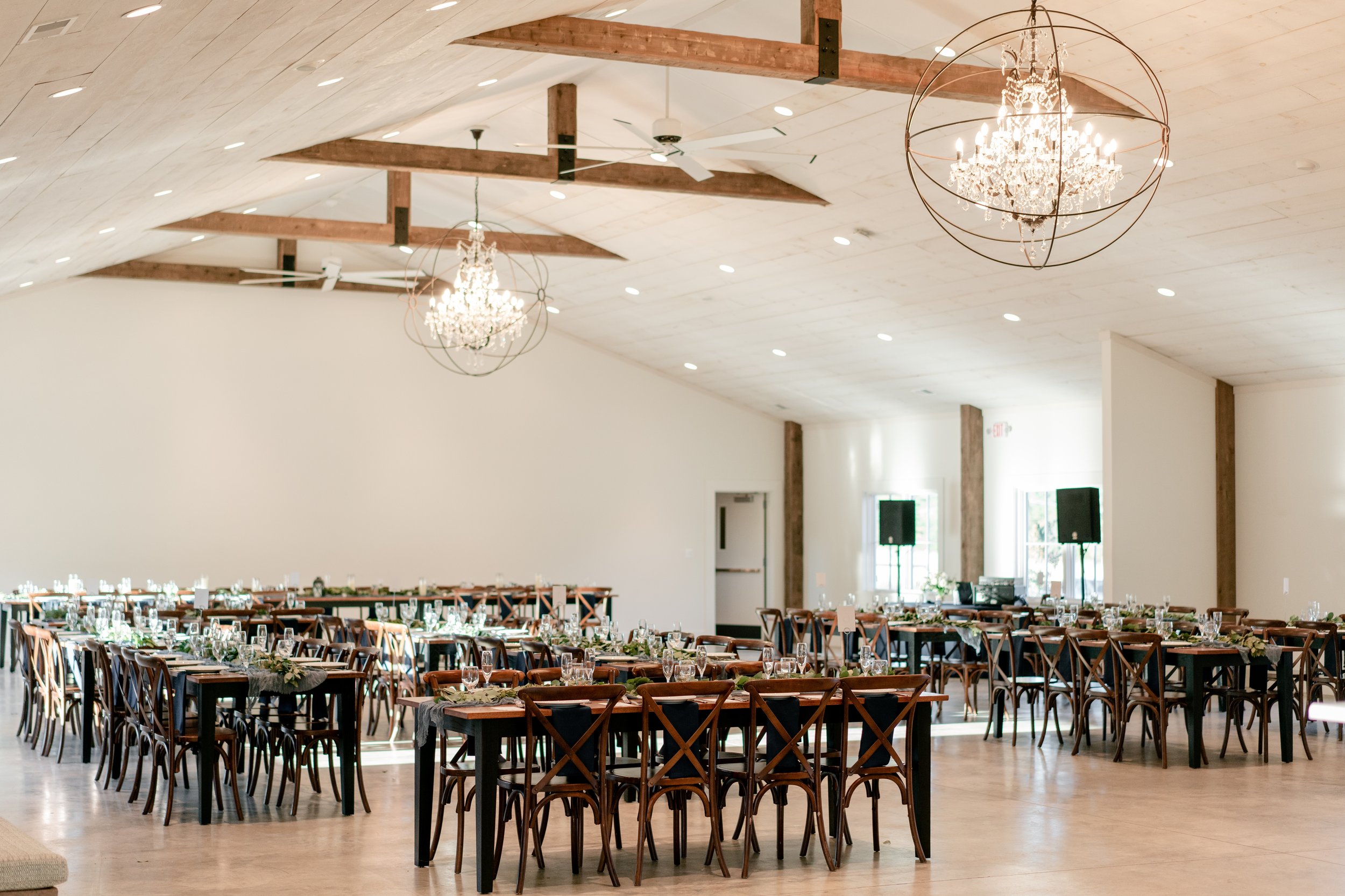 A wide angle view of a wedding reception at Fleetwood Farm Winery in Loudoun County