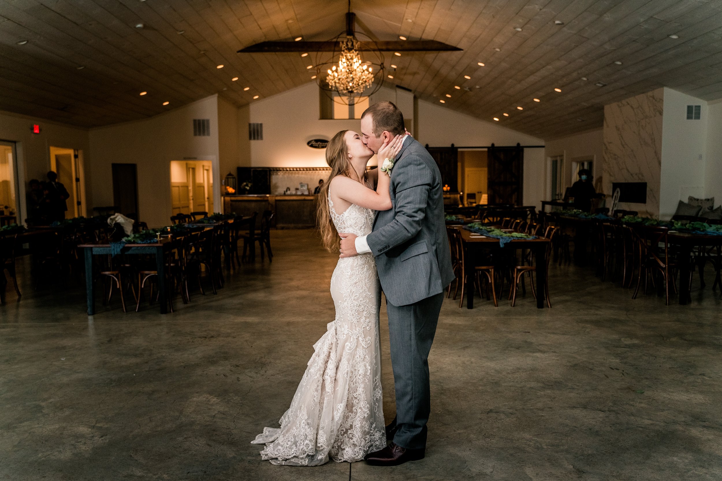 A bride and groom share a kiss during their private last dance at the end of their wedding at one of the best wedding venues in Northern Virginia