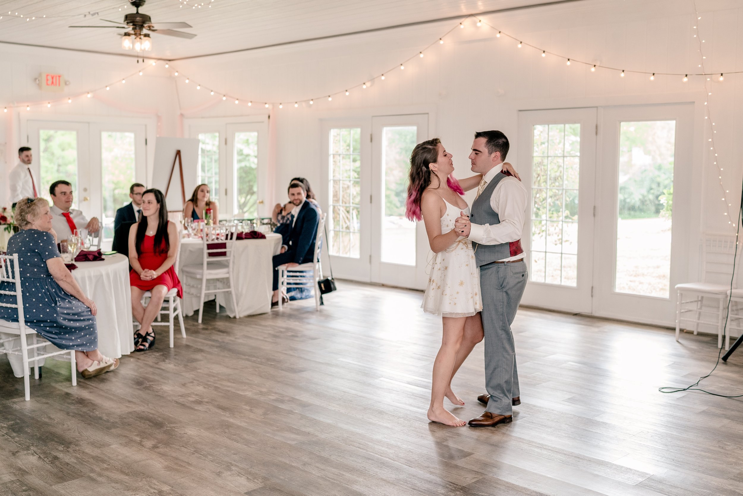 A bride and groom share their first dance during a wedding at one of the best wedding venues in Northern Virginia