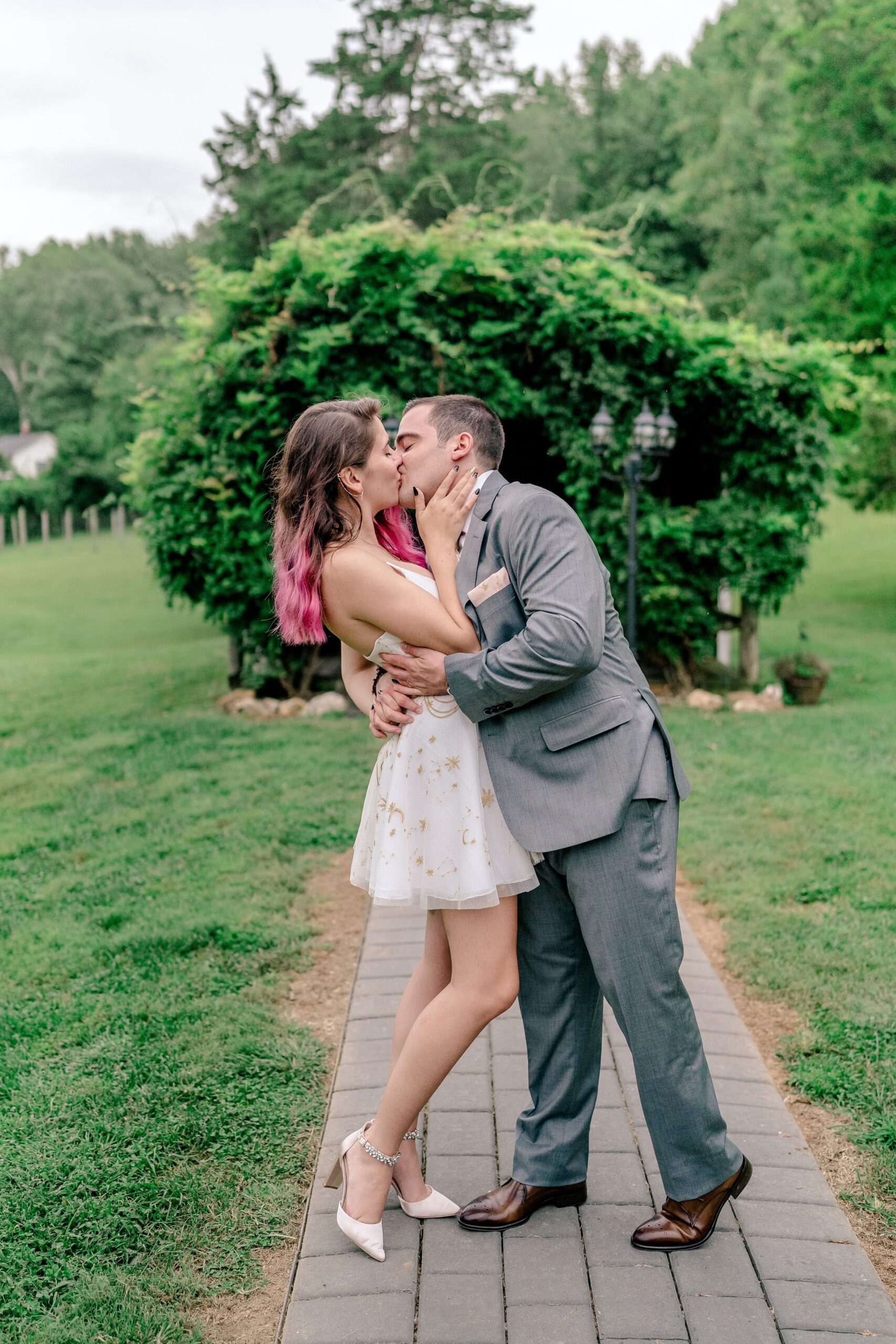 A bride and groom share a kiss at one of the best wedding venues in Northern Virginia