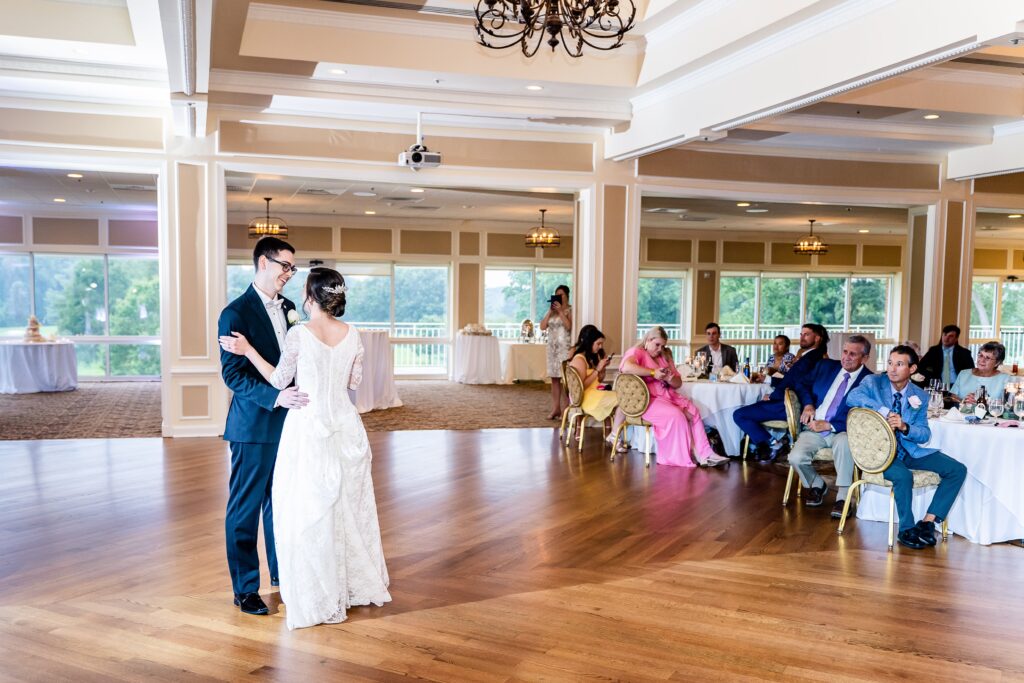 A bride and groom sharing their first dance at one of the best wedding venues in Fairfax County Virginia