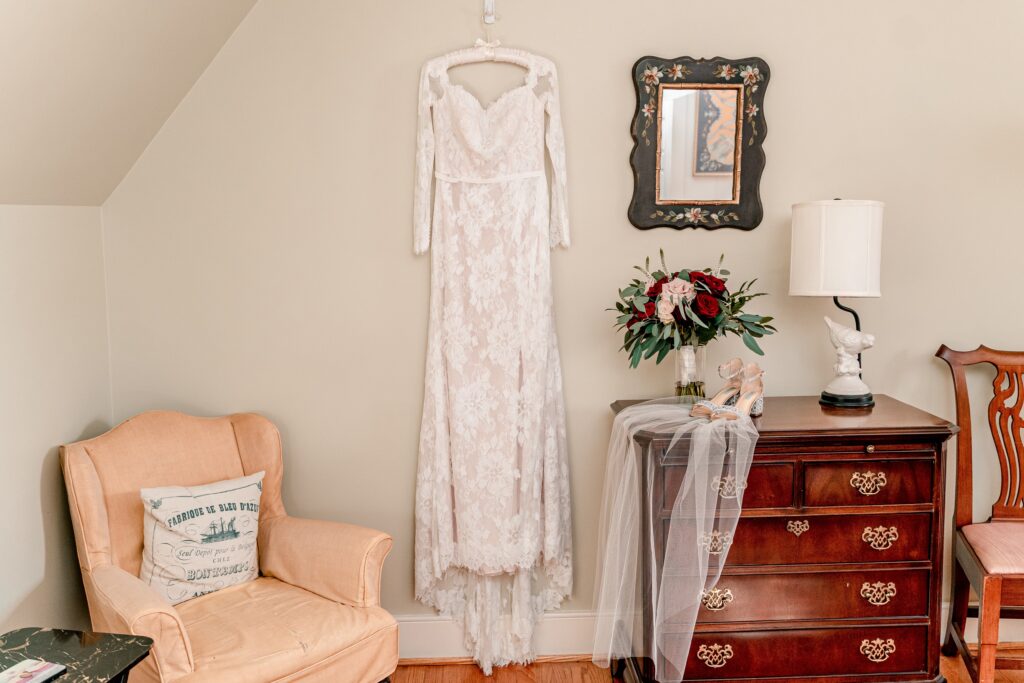 A wedding dress hanging in a historic house