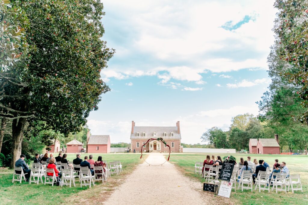 A ceremony in front of the mansion for a wedding at Gunston Hall in Northern Virginia