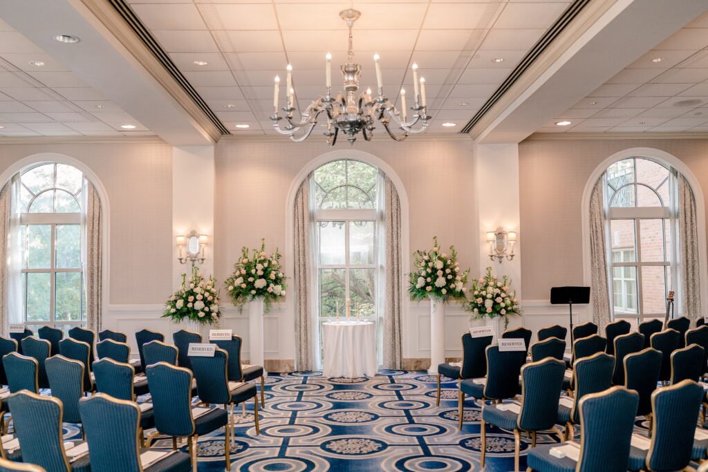 A wide angle view of an indoor wedding ceremony at the Westfields Marriott Washington Dulles