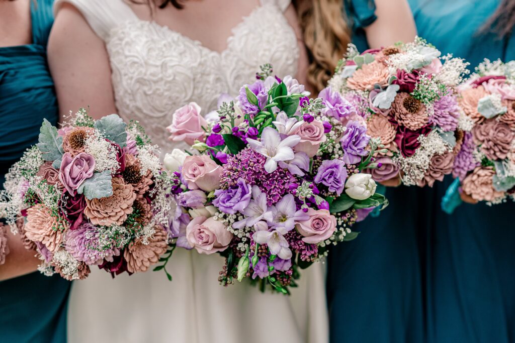A close up of the purple bridal bouquet