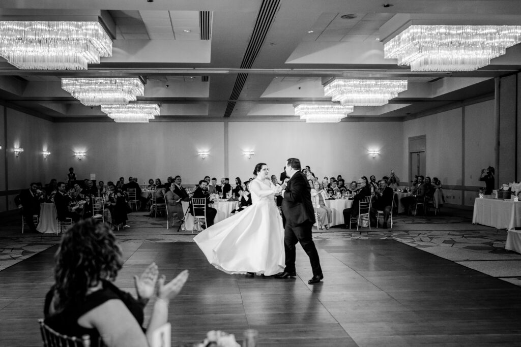 A bride and groom share their first dance after their Catholic wedding in Maryland