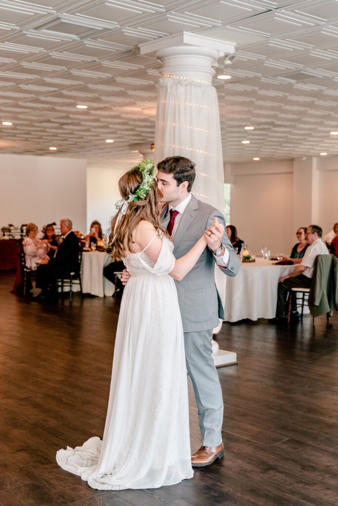 A bride and groom share their first dance at one of the best wedding venues in Fairfax County