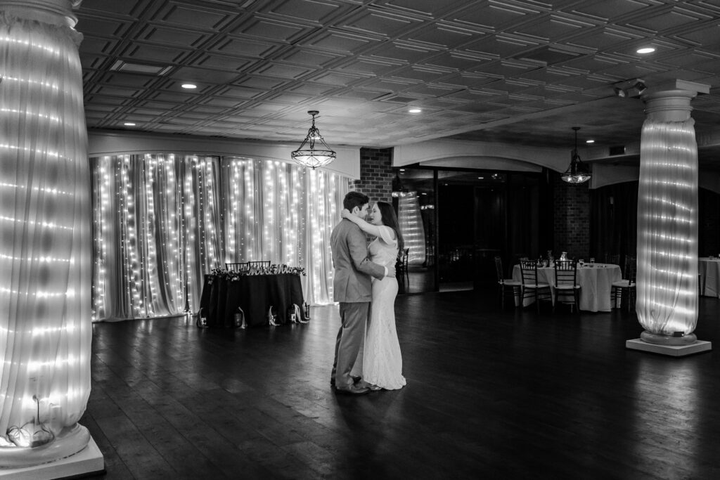 A bride and groom share a private last dance during their wedding at Harbour View Events
