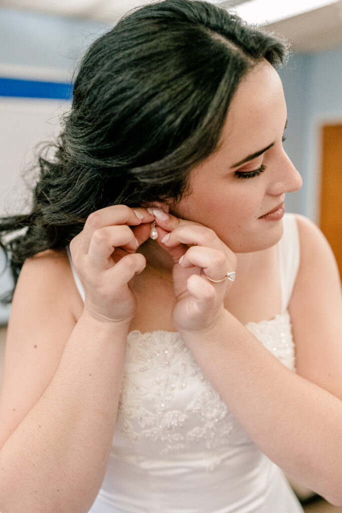 A bride getting ready for a wedding at St Philip Catholic Church in Falls Church Virginia