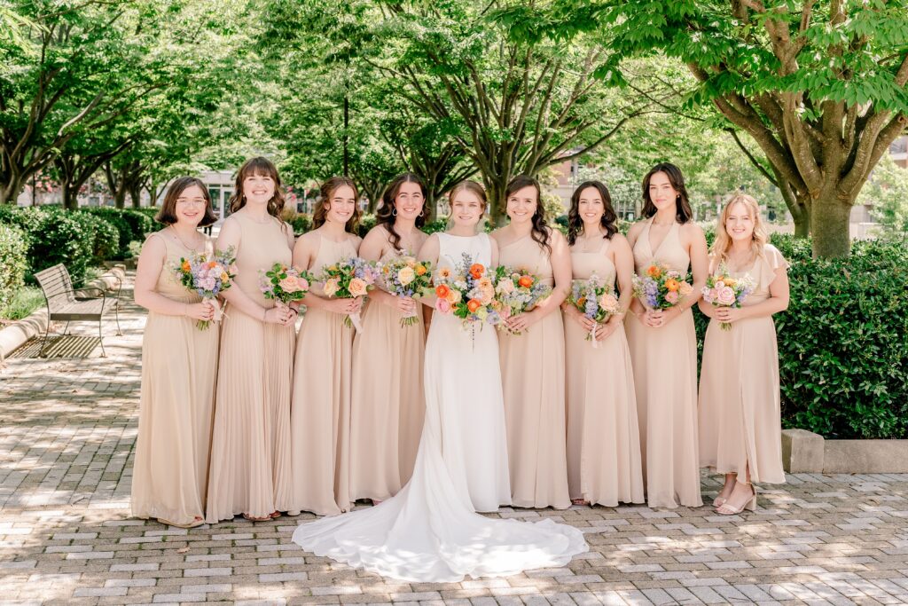 A bridal party smiling for a Sheraton Reston wedding