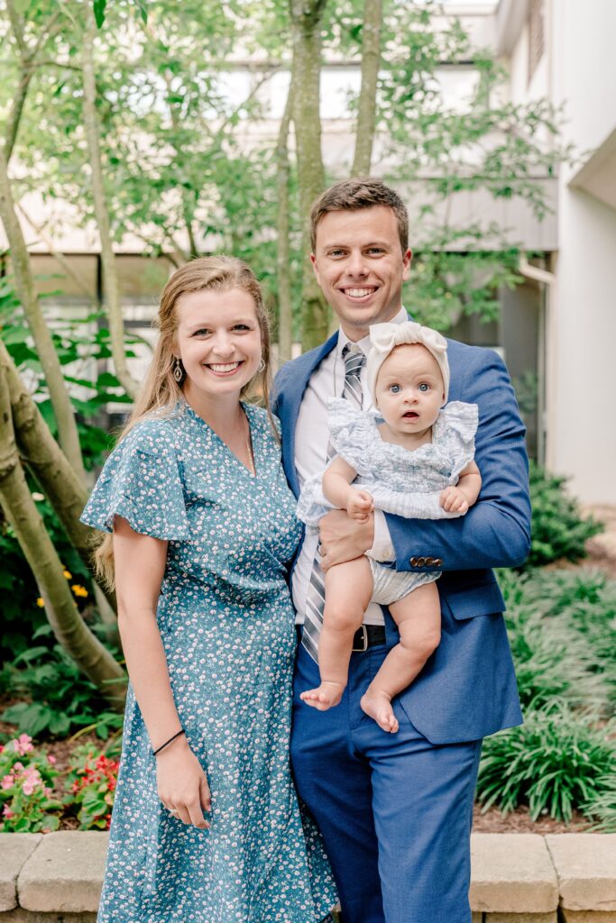 A family smiles for a classic portrait during a Sheraton Reston wedding reception