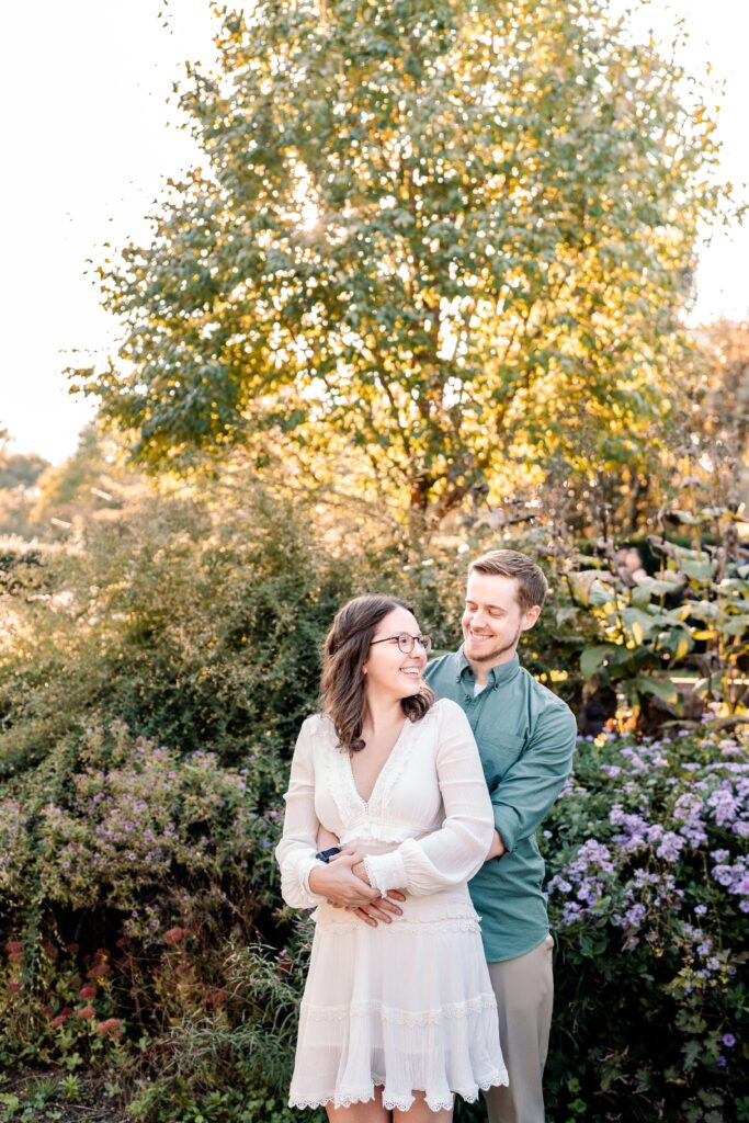 A couple laughing together by Washington DC wedding photographer Beauty of the Soul Studio