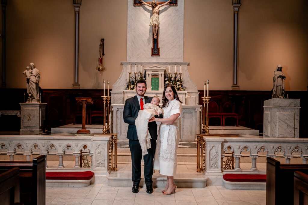 A family portrait after a Catholic baptism at St. Mary's in Old Town Alexandria