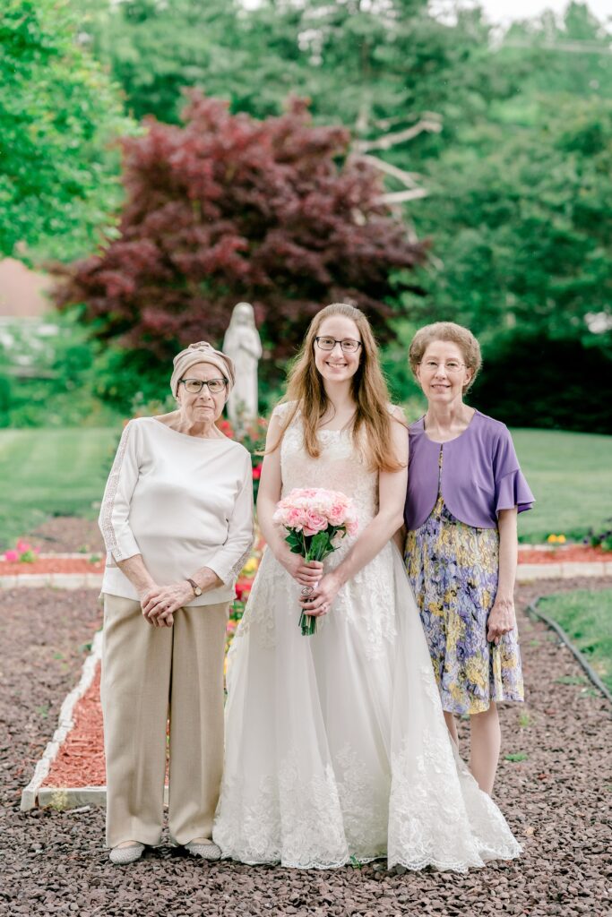 A bride with her mom and grandmother