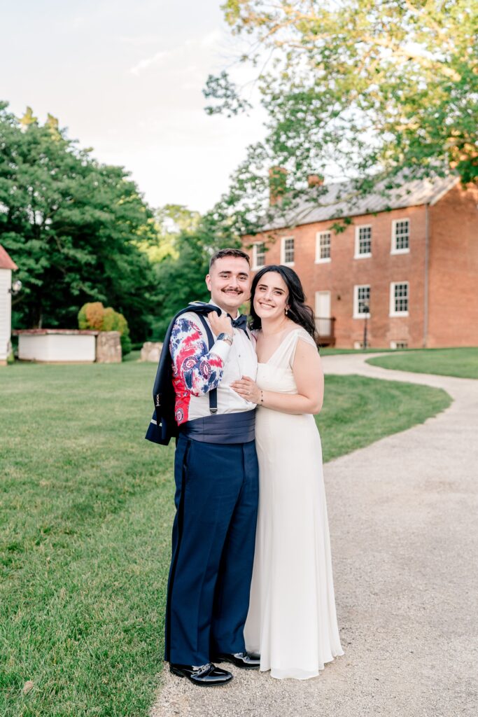 A bride and groom smiling for a classic portrait during their wedding at Historic Blenheim in Fairfax Virginia