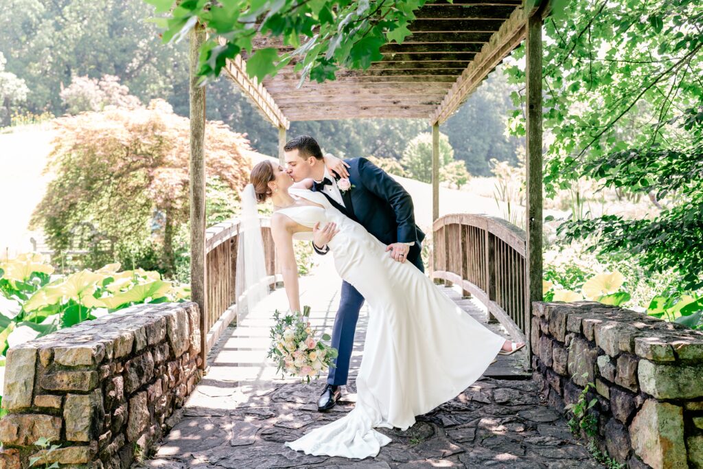 A bride and groom portrait during a wedding at The Atrium at Meadowlark Botanical Gardens