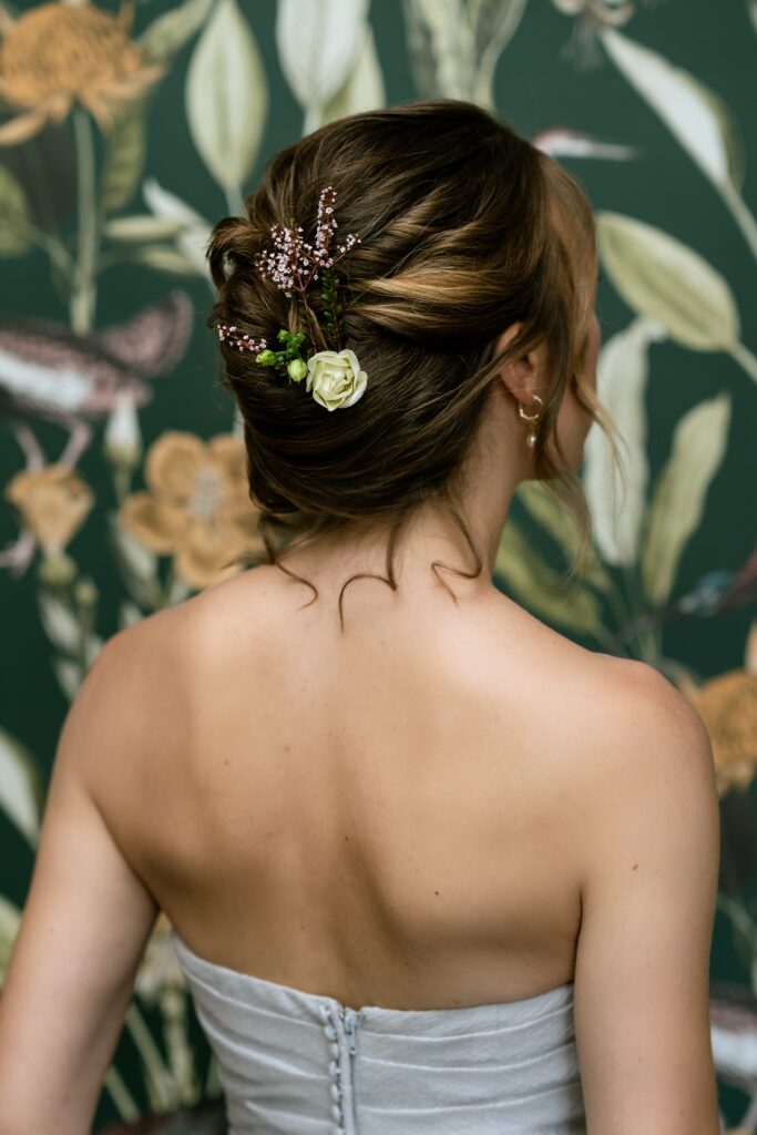 An intricate floral bridal hair style