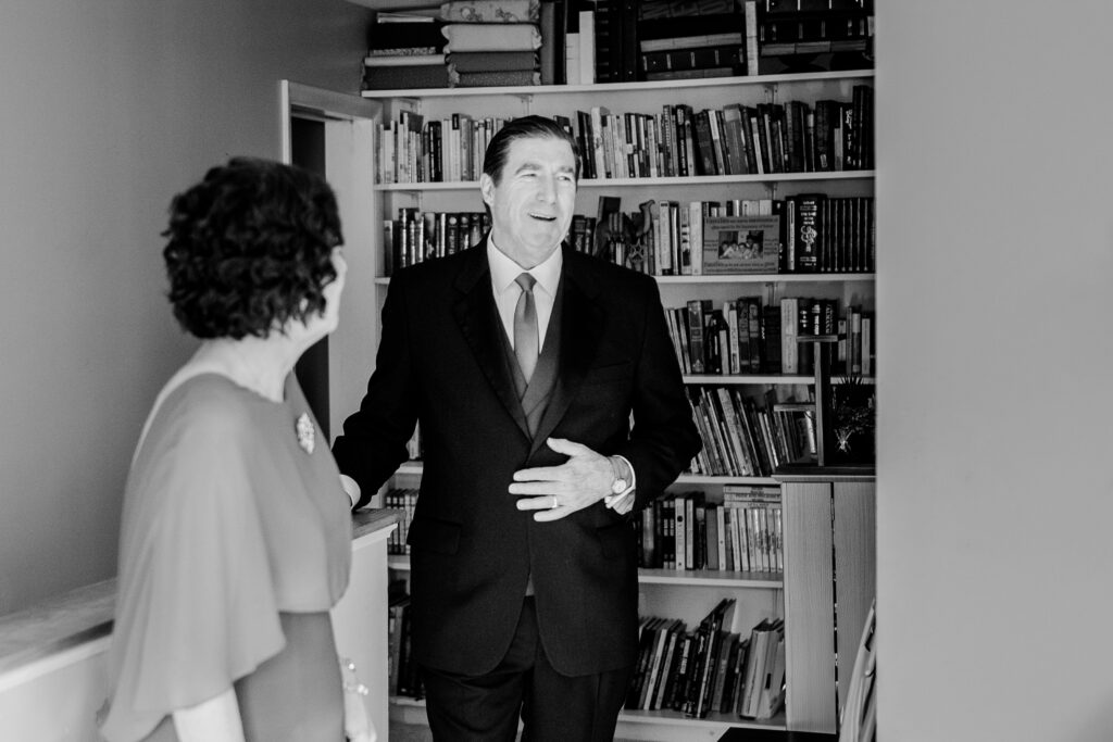 A father's first look with his daughter during her Christmas themed wedding in Northern Virginia