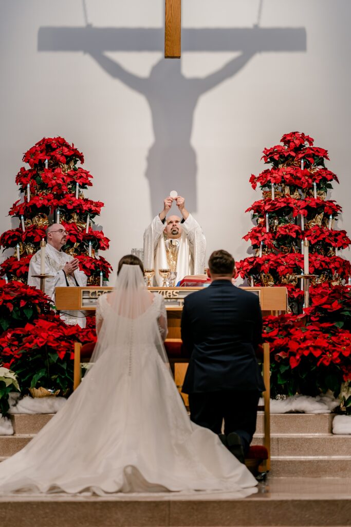 The Consecration of the Eucharist during a Catholic wedding in Northern Virginia