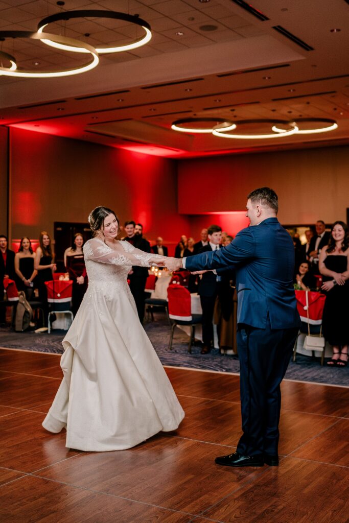 A bride and groom dancing together during their reception