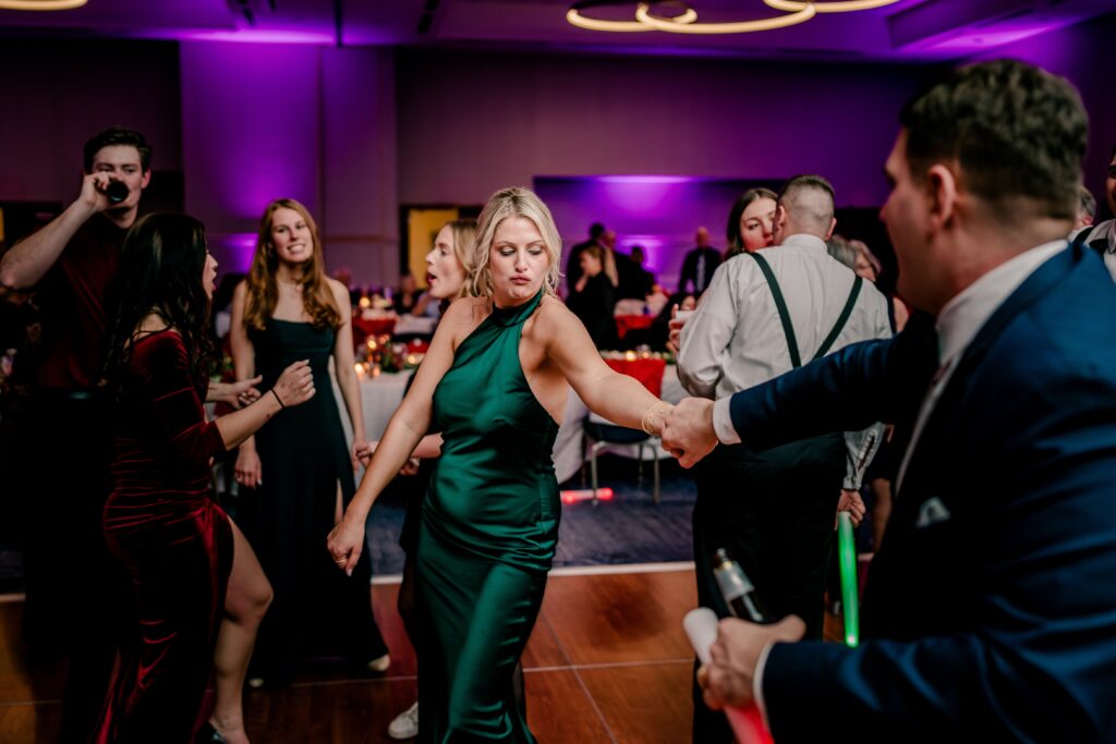 Wedding guests dancing together