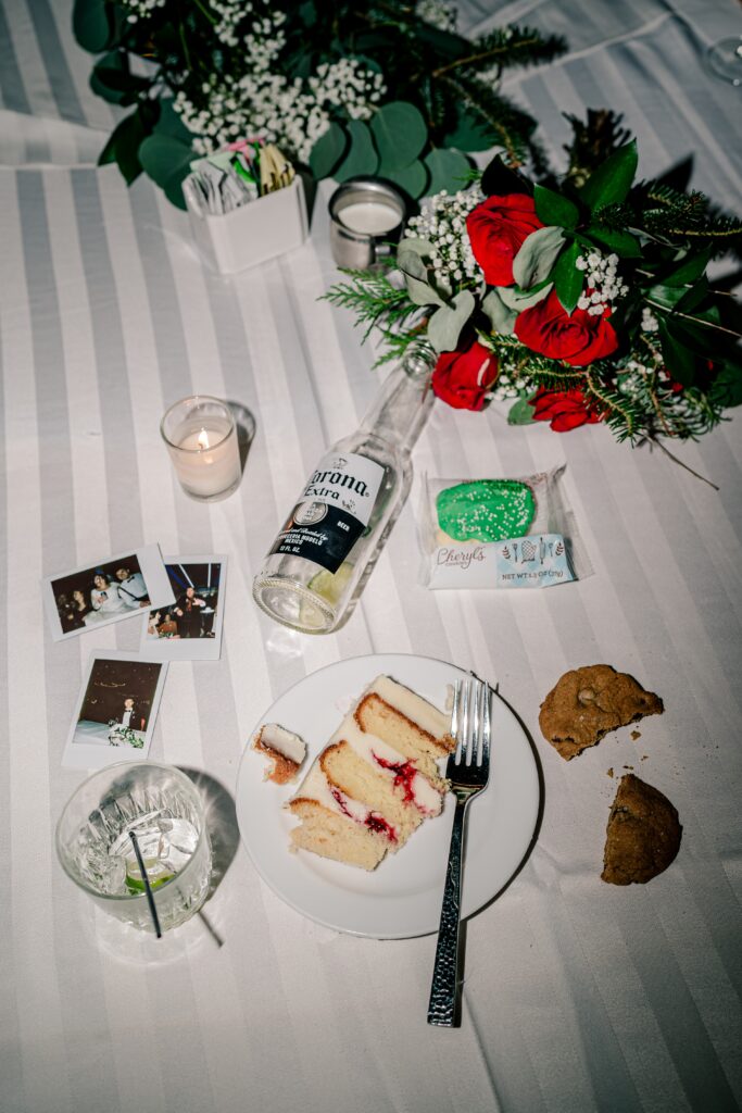 A late night flat lay featuring cake during a Christmas themed wedding at the Hyatt Regency Dulles in Herndon Virginia