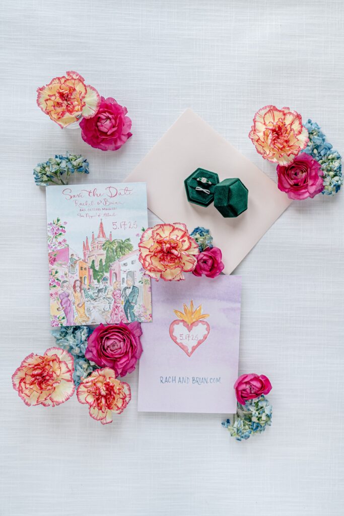 Custom watercolor save the dates featuring colorful flowers