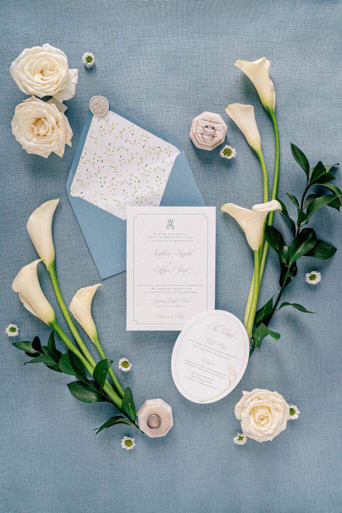 Elegant wedding flat lays featuring calla lilies and white roses