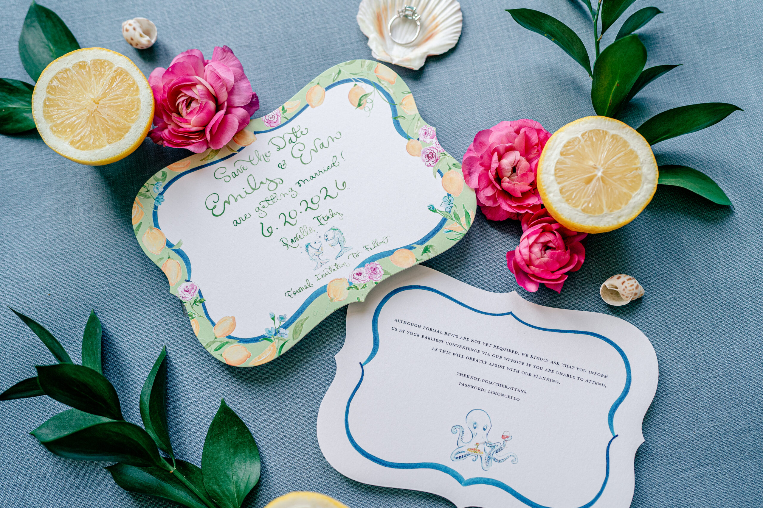 Wedding flat lays featuring custom watercolor save the dates