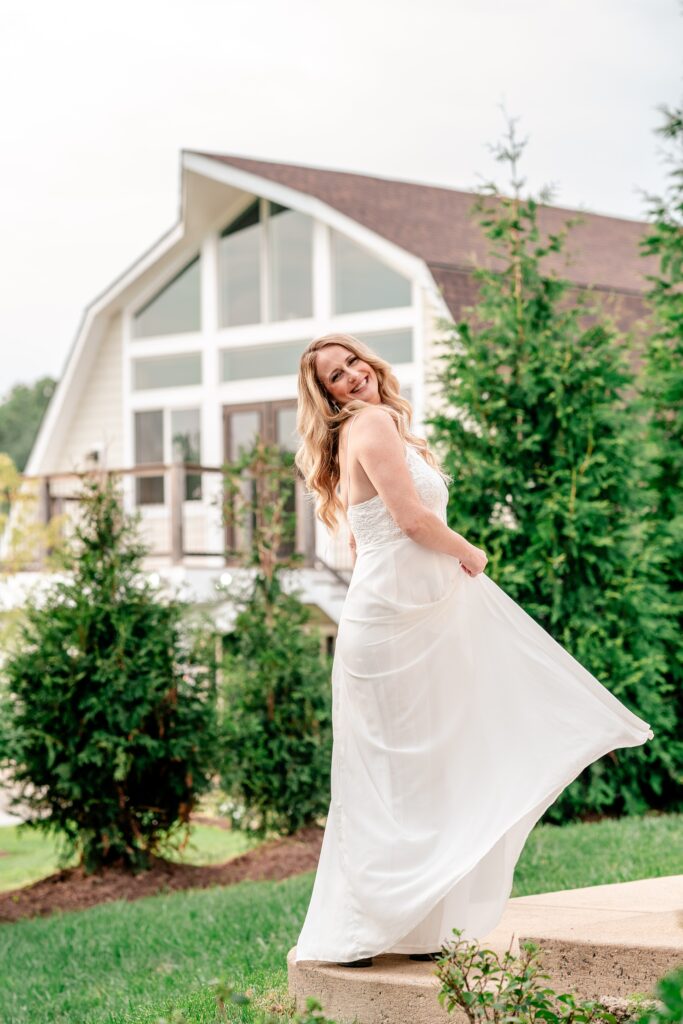 A bride smiling over shoulder for a Northern Virginia wedding