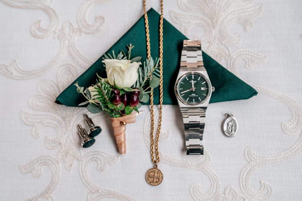 A flat lay of groom's details
