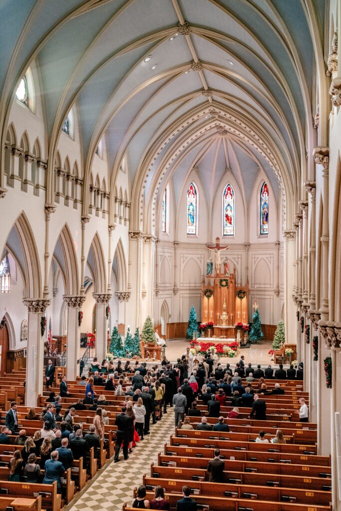 A view of a wedding from the choir loft of the church
