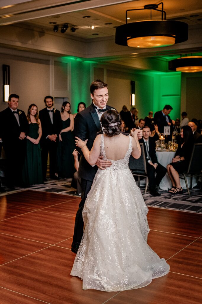 A bride and groom sharing their first dance after their St Dominic DC wedding