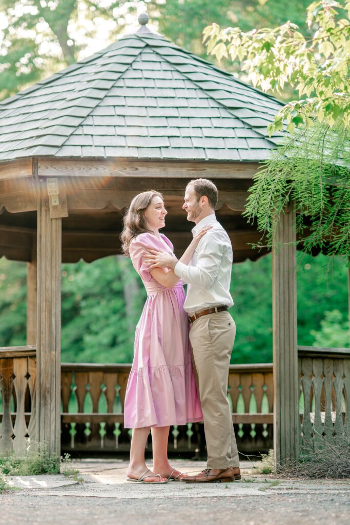 A couple posing for portraits at one of the best garden venues in Northern Virginia
