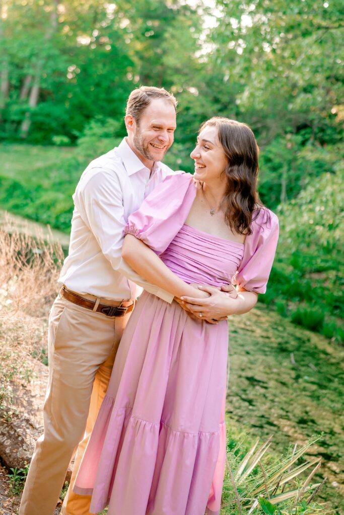 Green Spring Gardens photos of an engaged couple laughing together
