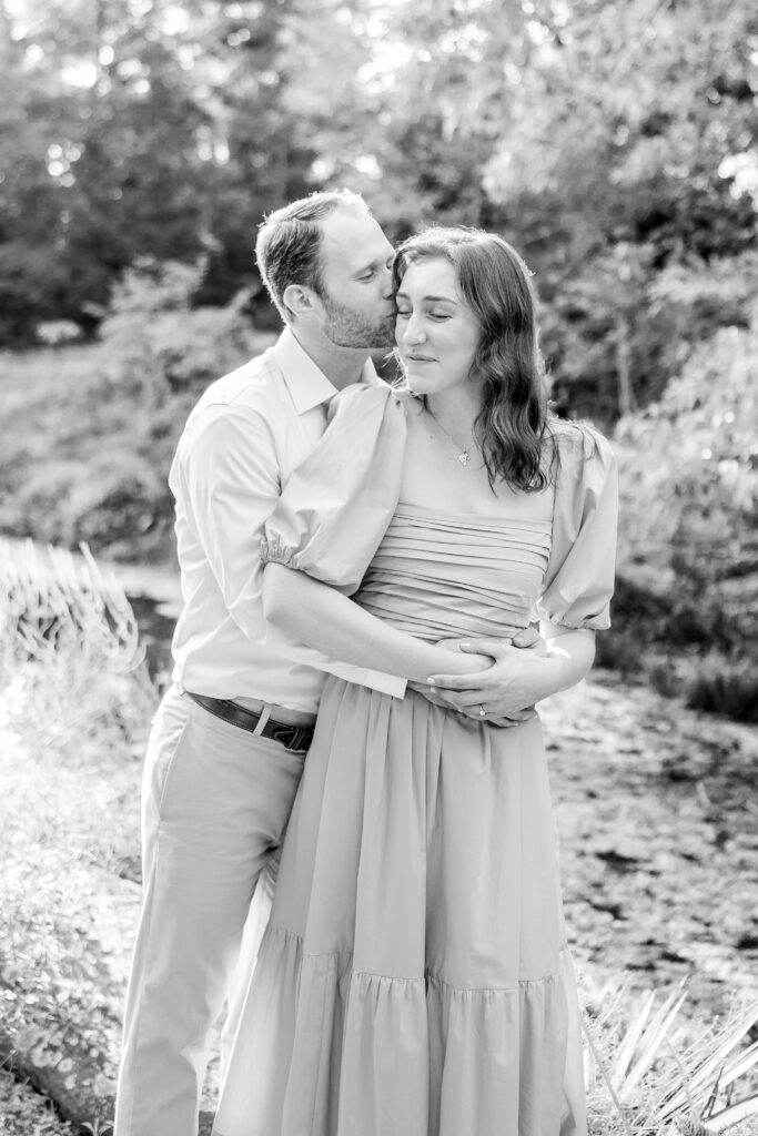 A tender cheek kiss for their Northern Virginia engagement photographer
