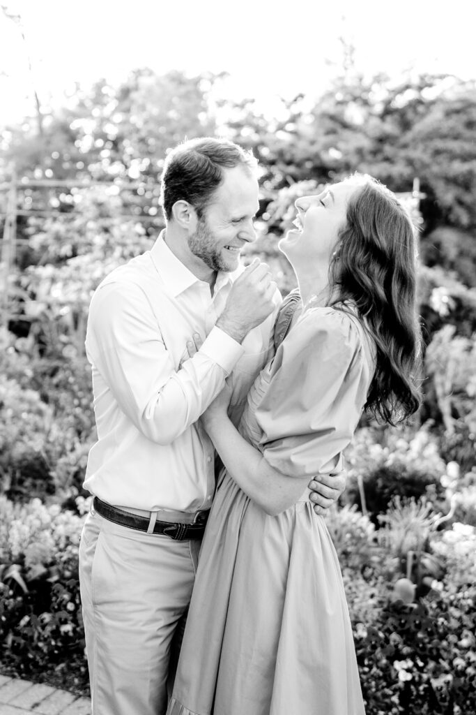 A couple laughing together for their Green Spring Gardens photos