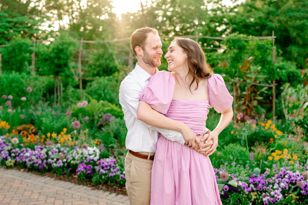An engaged couple laughs together for their Northern Virginia engagement photographer