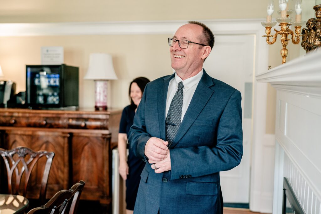 A father looking at his daughter as a bride for the first time during a Marymount University wedding