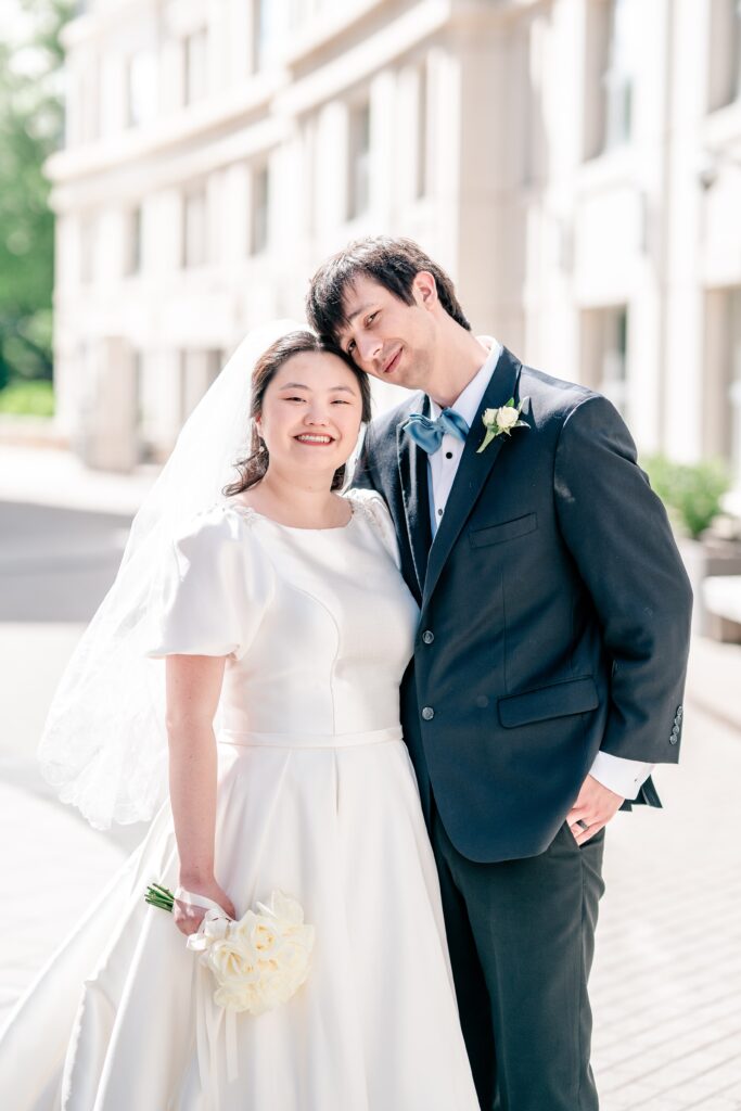 A classic close up portrait of a bride and groom