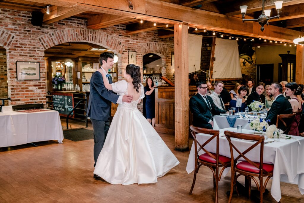 A bride and groom dance together during their Union Street Public House wedding