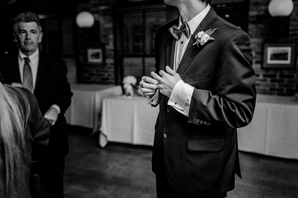 A groom playing with his ring during his Union Street Public House wedding