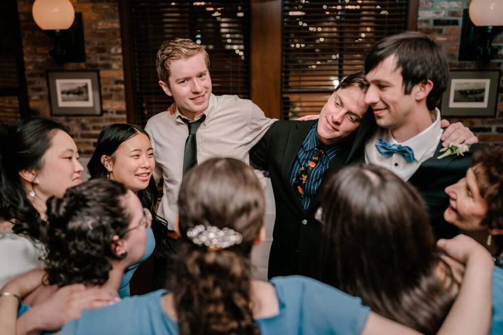 A group of friends dancing together during a Union Street Public House wedding