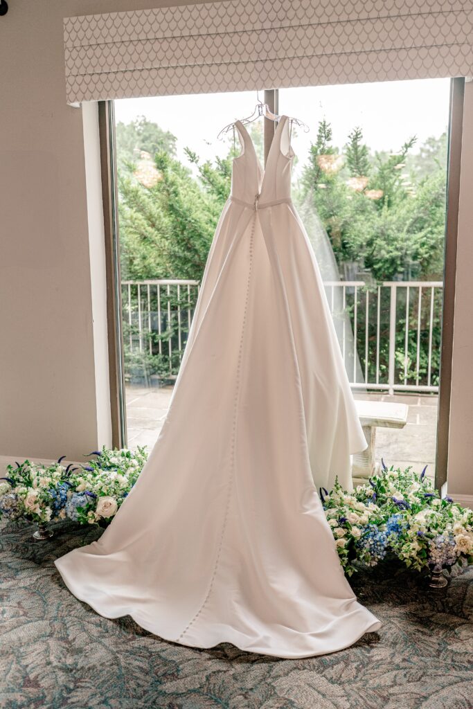 A wedding dress hanging for a Sts. Peter and Paul Antiochian Orthodox Church wedding in Potomac, Maryland