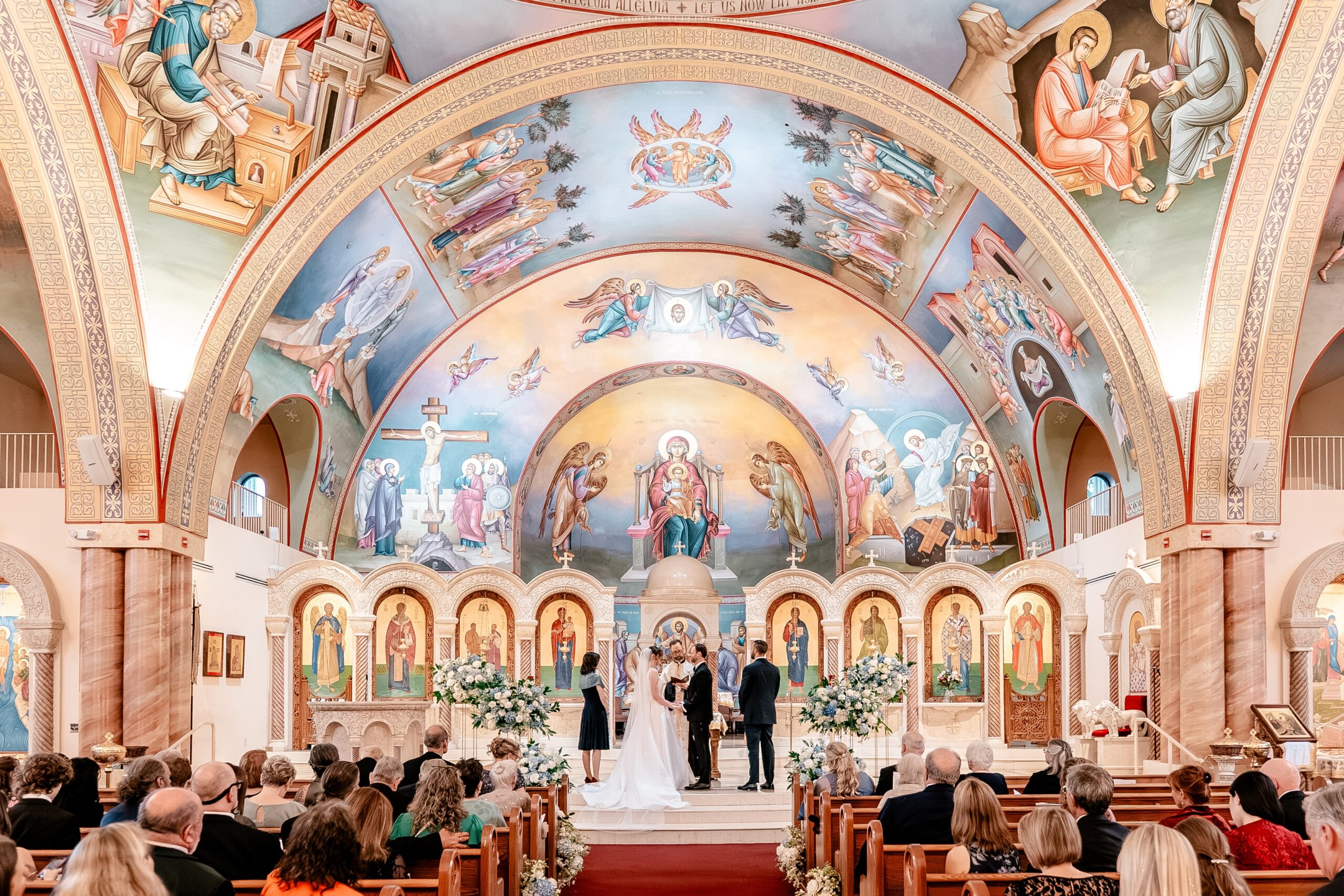 A wide photo of a Greek Orthodox wedding at Sts. Peter and Paul Antiochian Orthodox Church