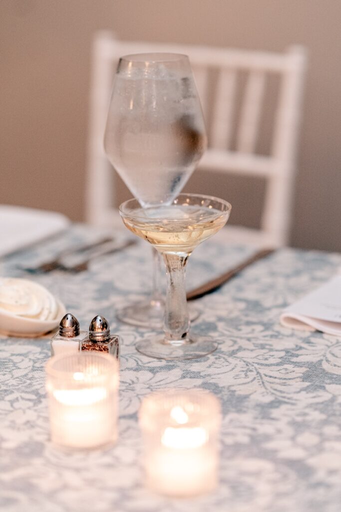 A champagne coup set for a reception to celebrate a Greek Orthodox wedding
